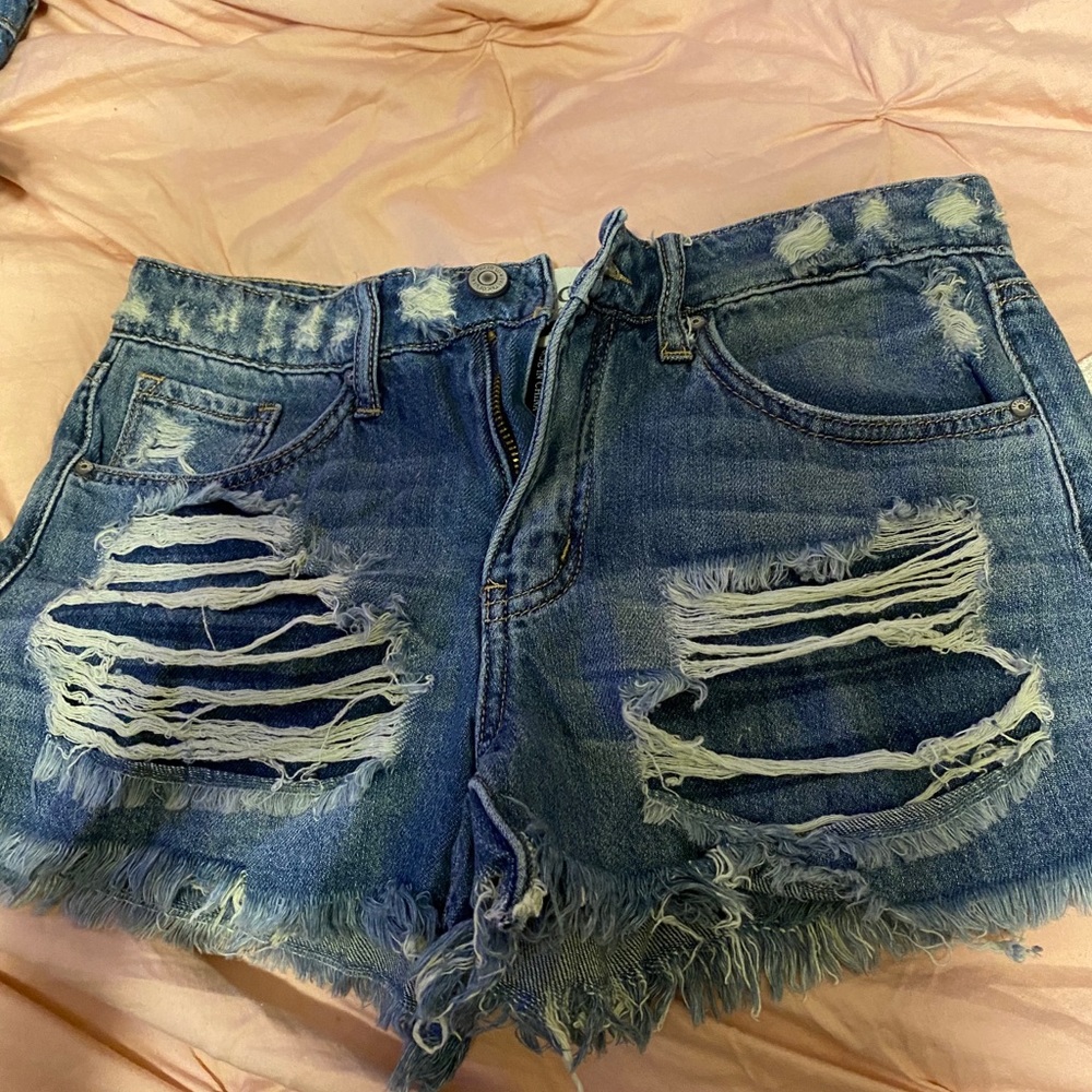 Distressed denim shorts